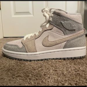 Woman’s Nike Jordan 1s high top particle grey